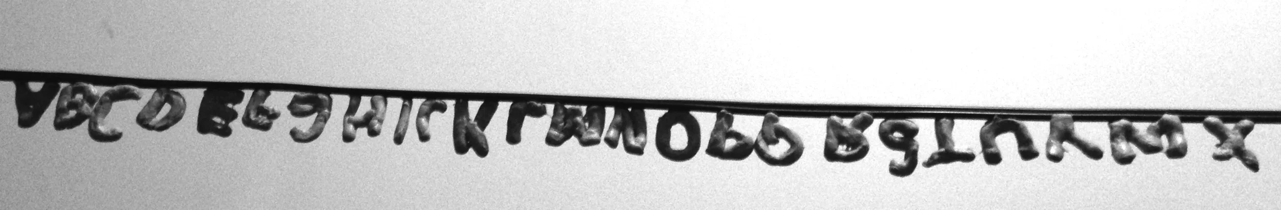 Each character was then hung upside down for periods of 48 hours to let gravity take effect.