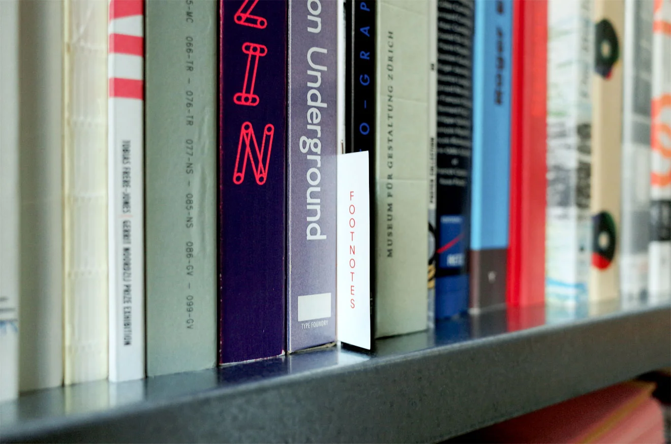 Footnotes is just two staples and can be hard to locate on your bookshelf. The bookmark was designed as a label too, handy!