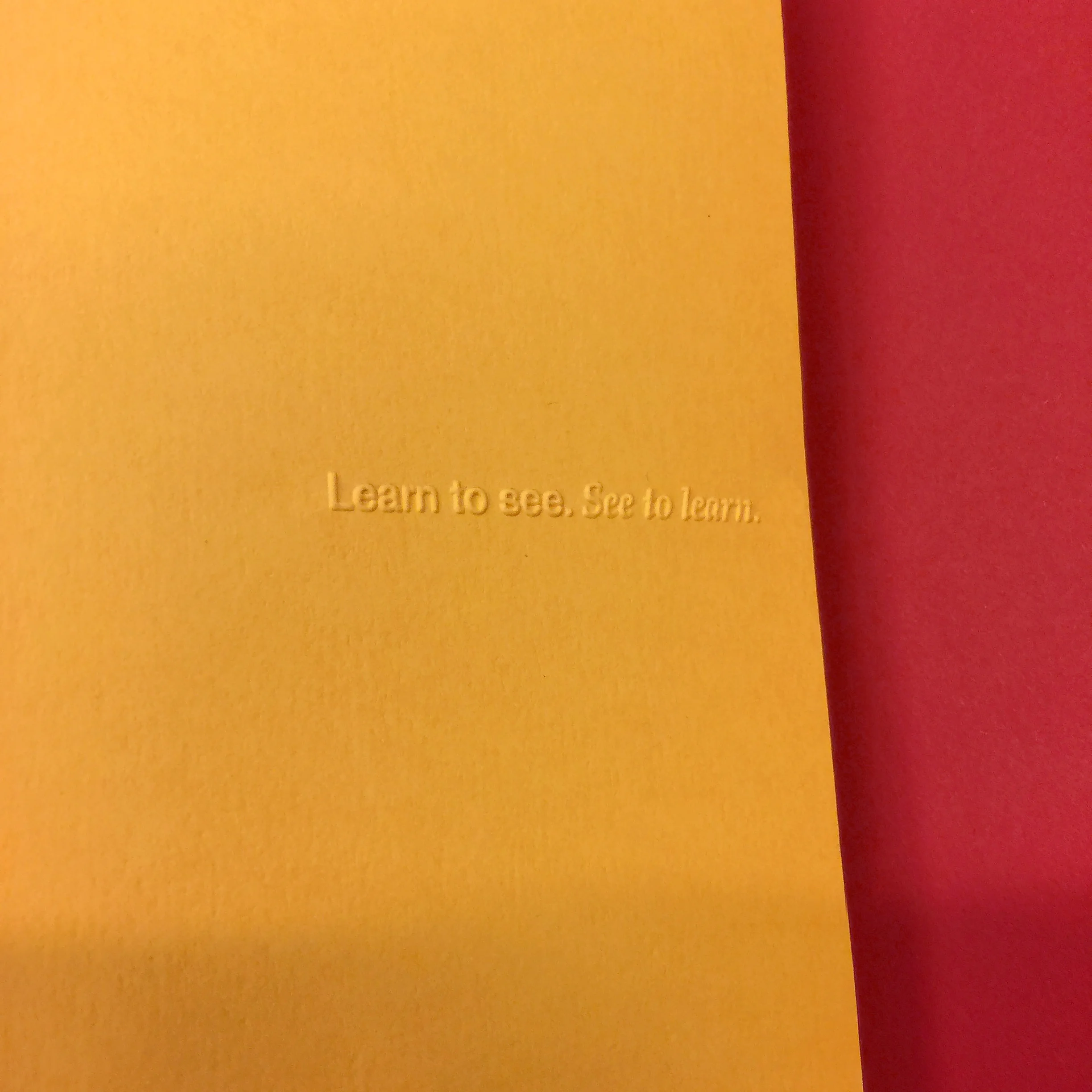 EMBOSSING THE COVER FLAP, Photo by Brenda McManus | BRED We embossed our mantra on the inside cover flap “Learn to see. See to learn.”