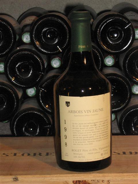 An example of a Clavelin bottle of Domaine Rolet Arbois Vin Jaune from an older vintage.