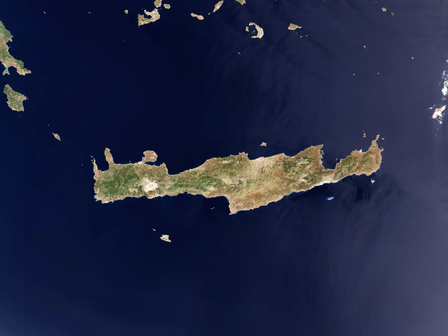 Satellite imagery of Crete, shows that much of the island is rugged, dry and mountainous, with much of the vineyards located in the centre-east, the widest north-south portion of the region.