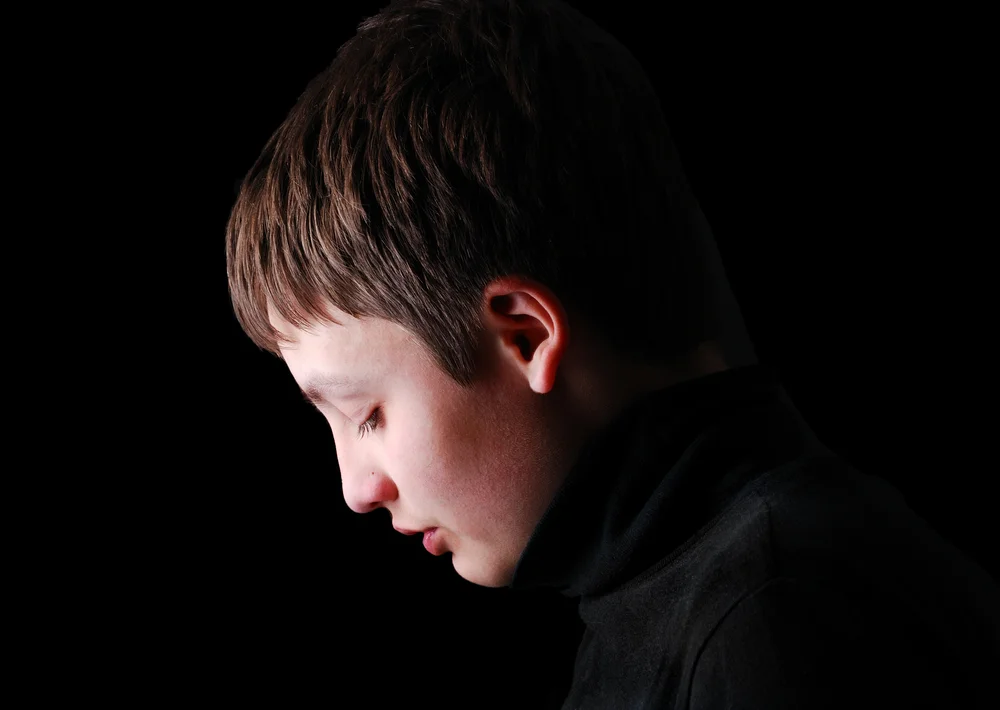 Child stressed and upset, which causing the defense posture
