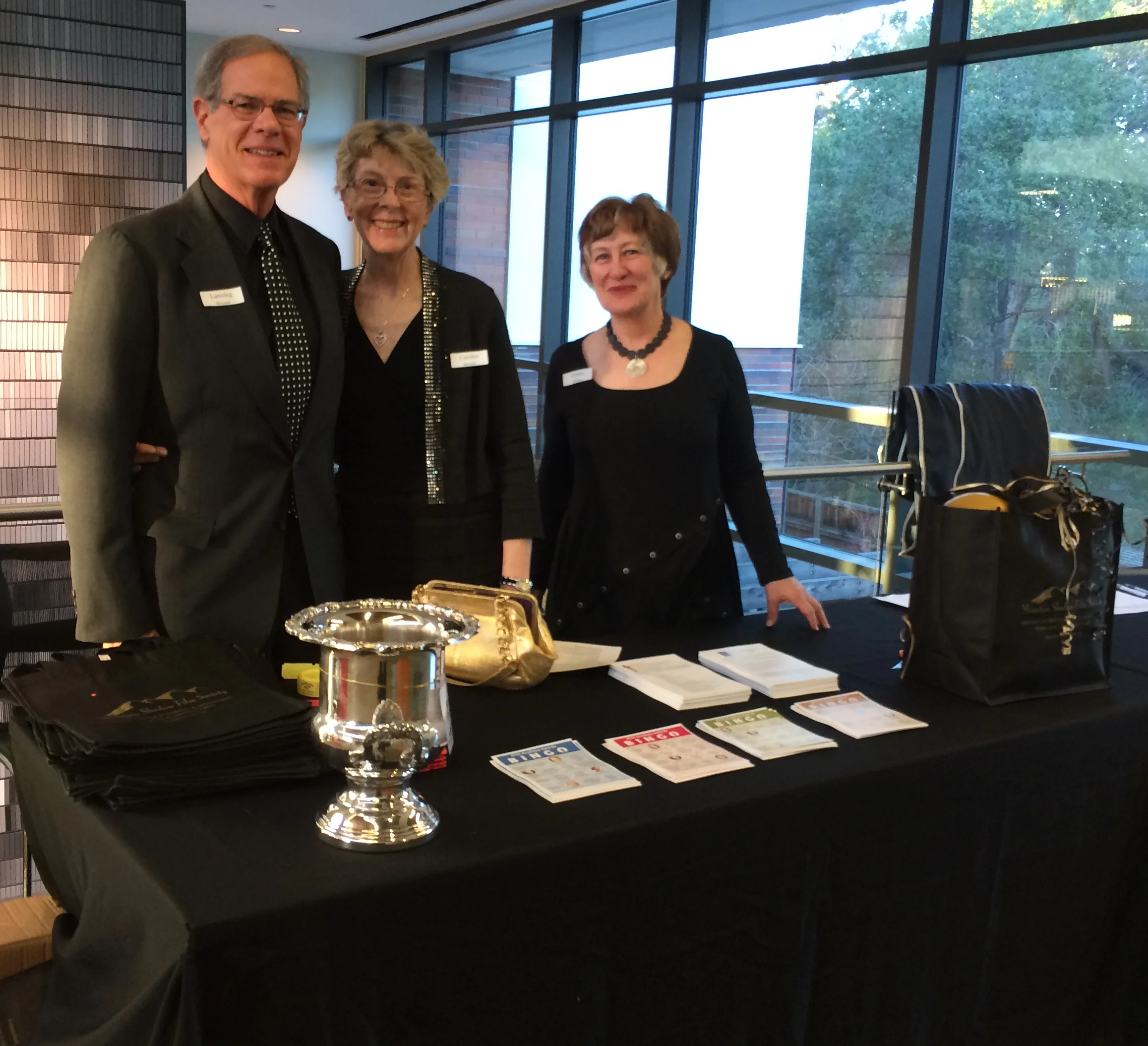 Party volunteers Lanning & Carolyn Bryant and Debbie Block help out at the Check-in Table