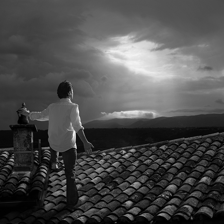 A Man Clambering To The Housetops