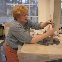 Diana Manchak has been working in clay since 1989. A long career in the travel industry, combined with her lifelong interest in Art, Art History, Archeology and Design has provided a foundation from which to view and perceive other cultures. Living in Africa and traveling the world has made a lasting artistic impression. These influences - foreign cultures, ancient arts, contemporary design and the natural environment - or elements of them can be found in her work. She began teaching Ceramics in 1995 to young neighborhood kids, and individual students in her studio, and a few years later began teaching classes for children and adults at a community center, including homeschool students. She has taught classes at both CSMD and at the University of Maryland Arts and Learning Center, private students when time permits and makes work for galleries, shows and exhibitions.