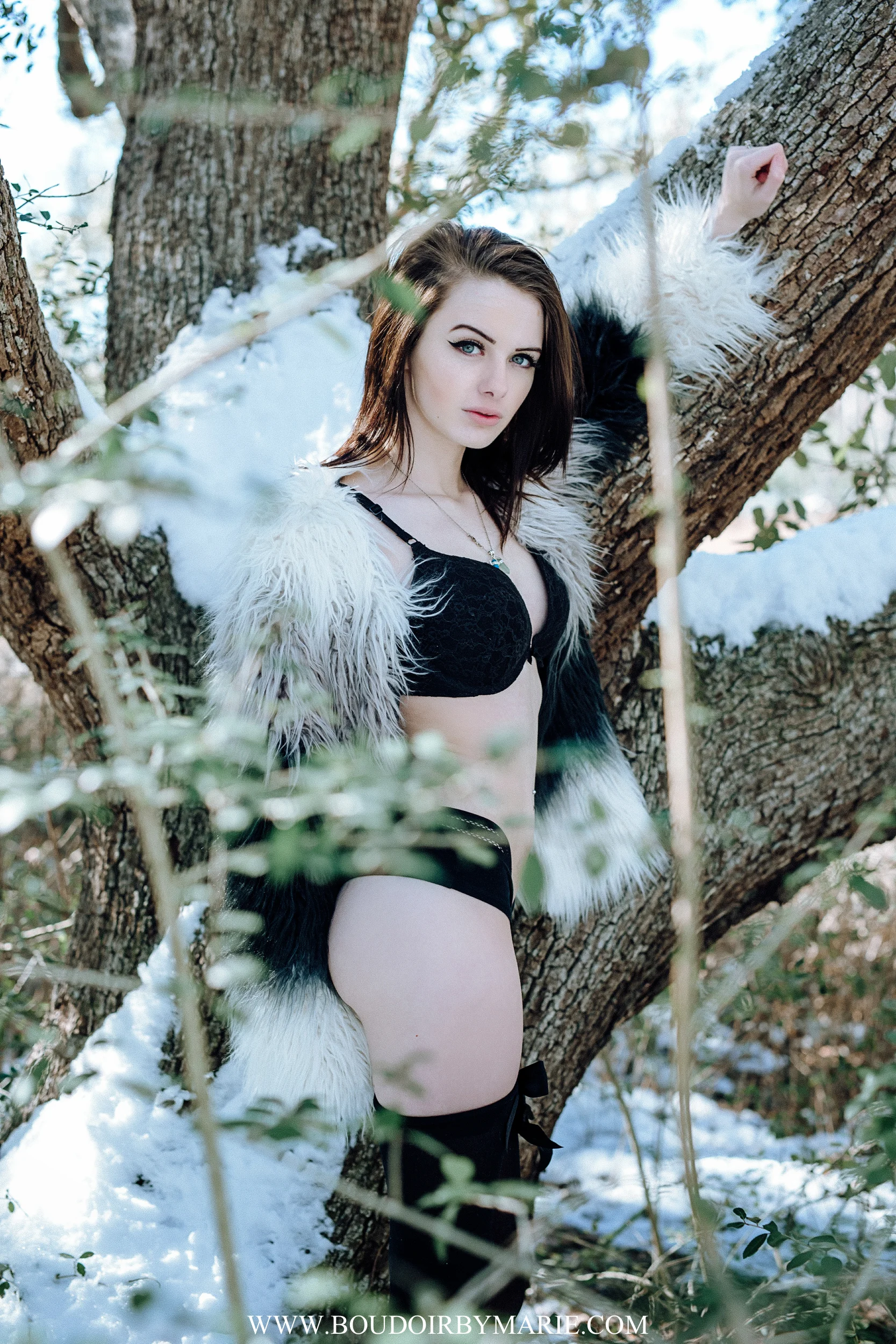 Black outfit showcased in winter snow boudoir photograph taken in Charleston, SC. 