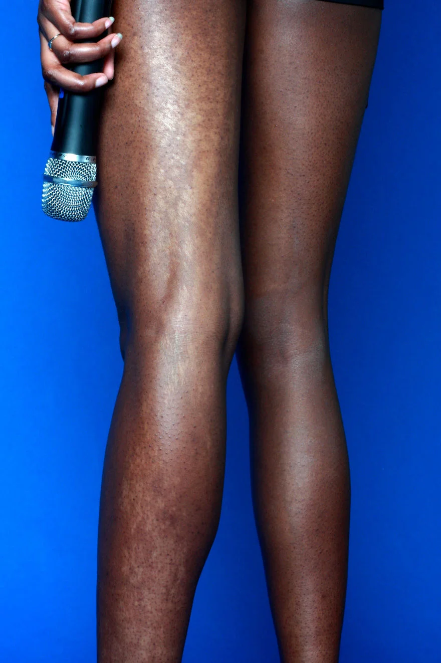 The essence I embrace…“Is my birthmark. It covers my entire left leg.” O-SliceThe mike represents her love for performing as a rapper, and is infamously known on campus by her stage name O-Slice.