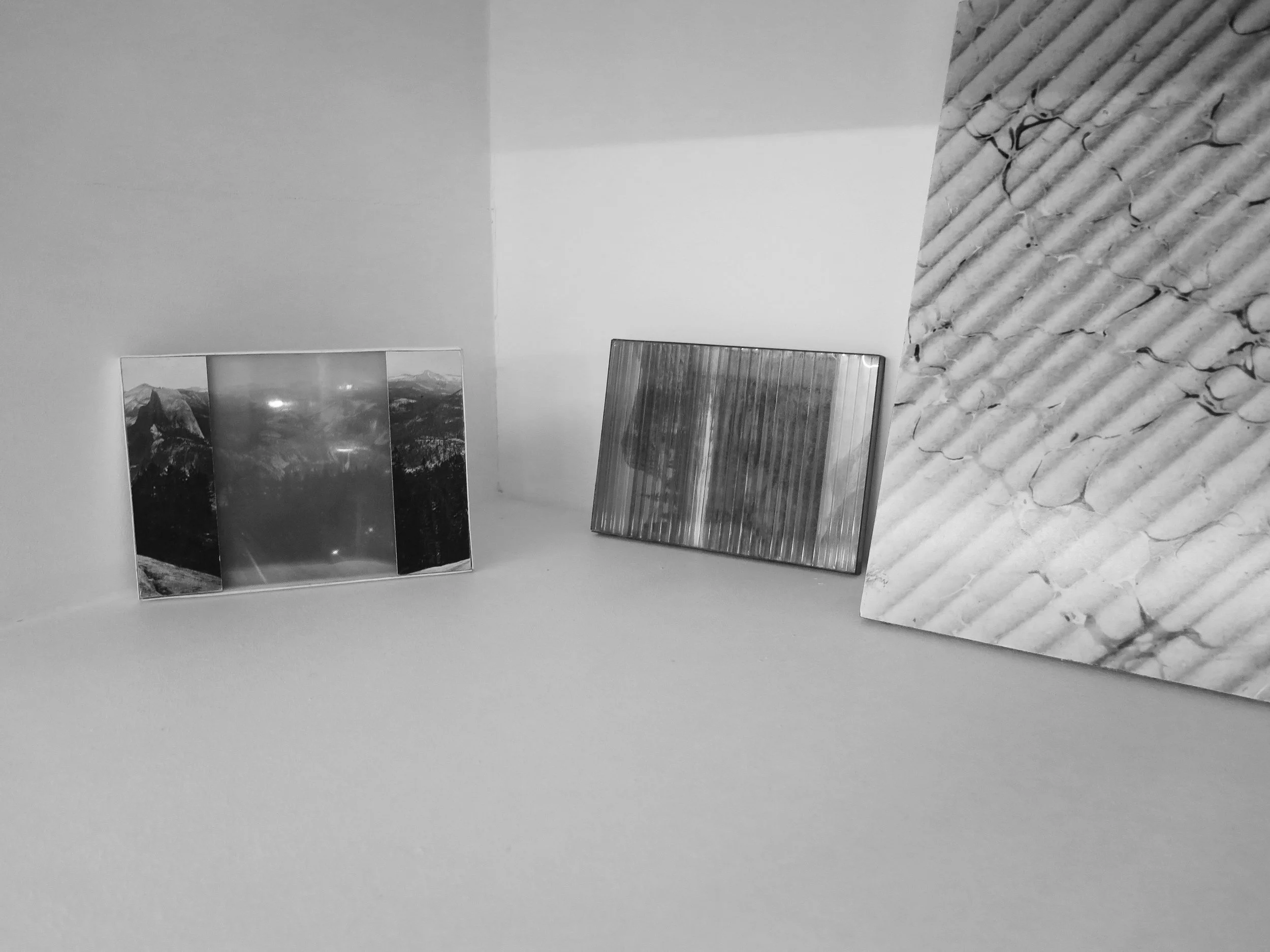 On view: Two postcards from the series Stereogram (2016) and two Ecritures (2015).
