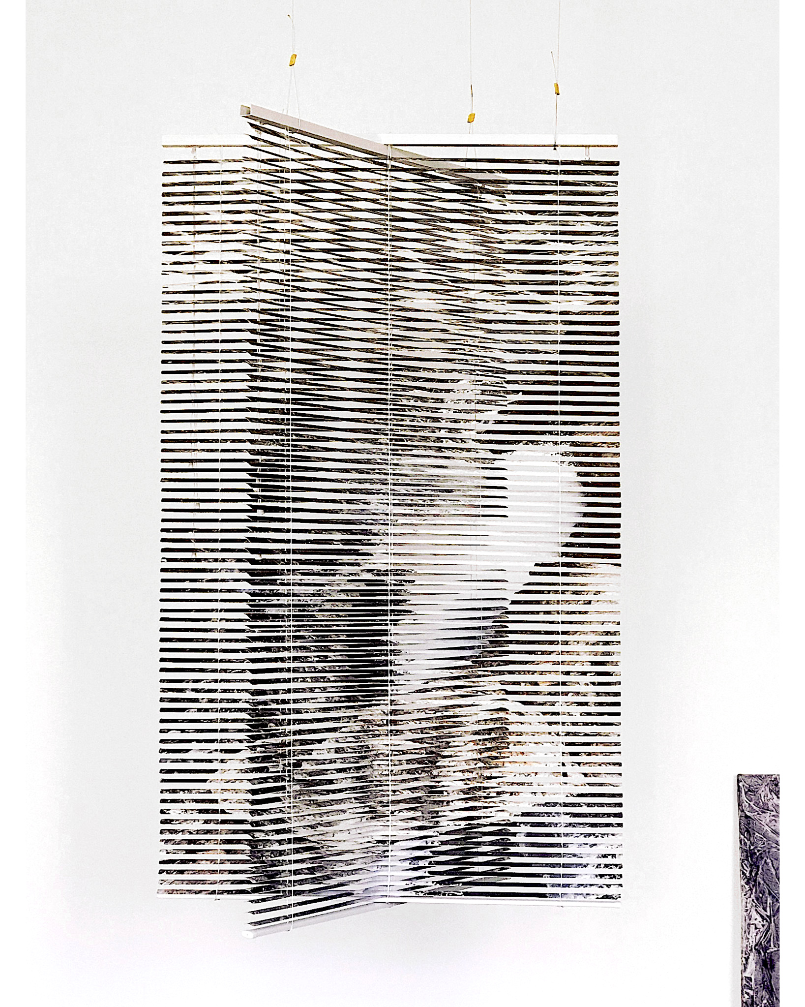 Turn of the Tide , 2018 inkjet and Xerox print on paper, pasted on Venetian vinyl blinds 162 x 92 x 42 cm