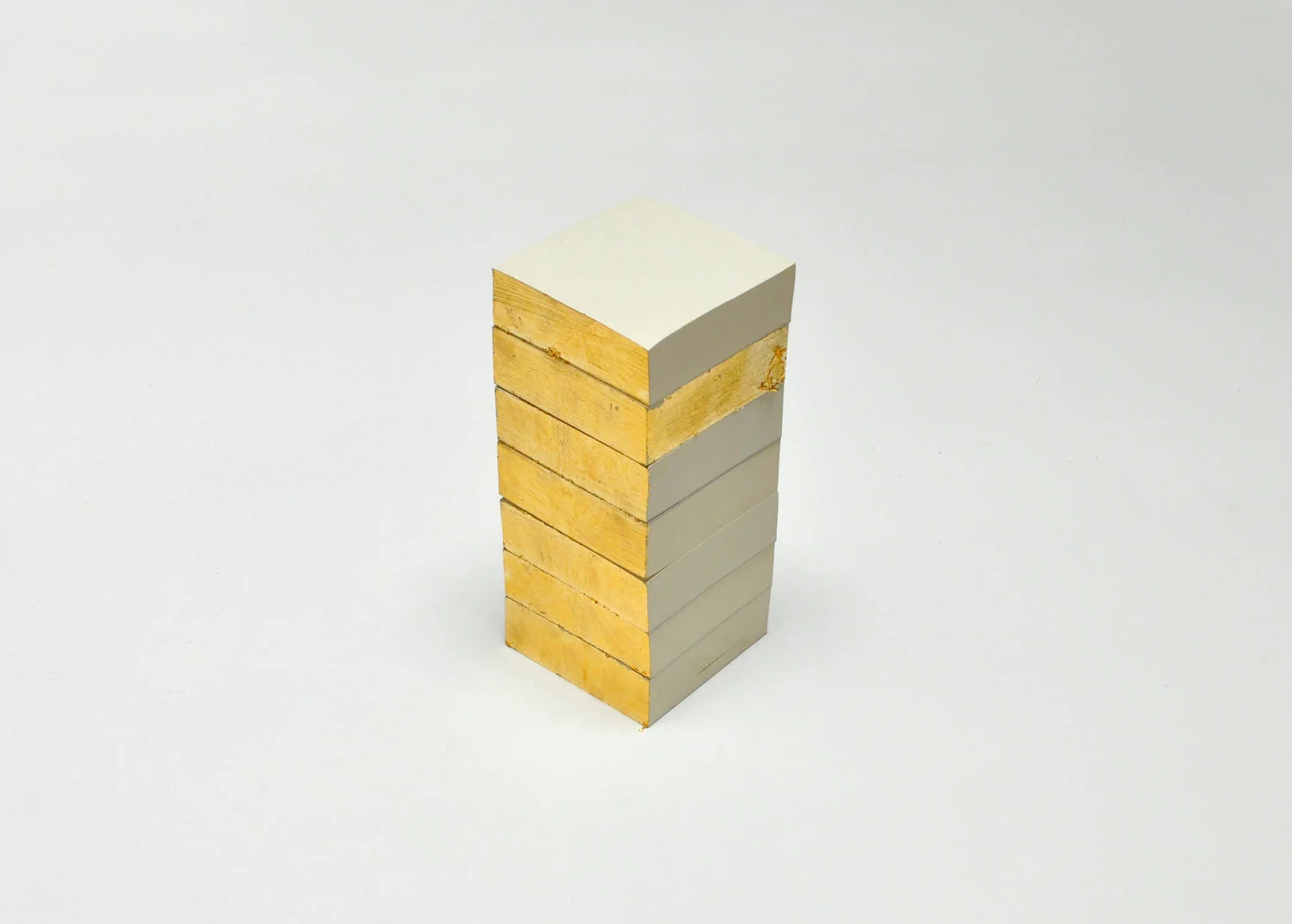 Tower , 2016 paper, cardboard, copper-zinc leaf 10 x 10 x 28 cm