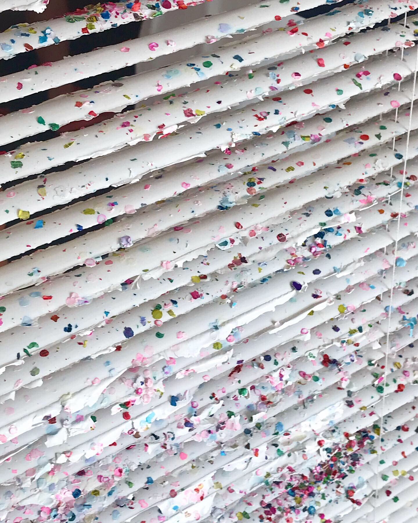   Confetti Blind , 2019 (detail) Mexican confetti, primer, acrylic on venetian vinyl blind 162 x 92 cm 