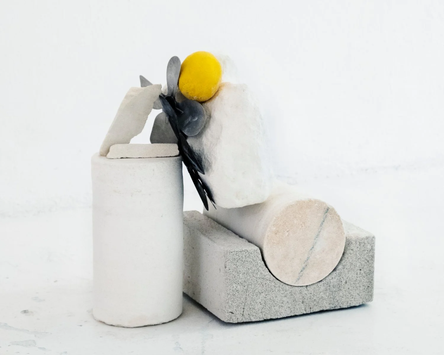   Lemon Eye , 2019 limestone, aerated concrete, metal fans, lemon  40 x 40 x 25 cm (15 3/4 x 15 3/4 x 10 inches)    