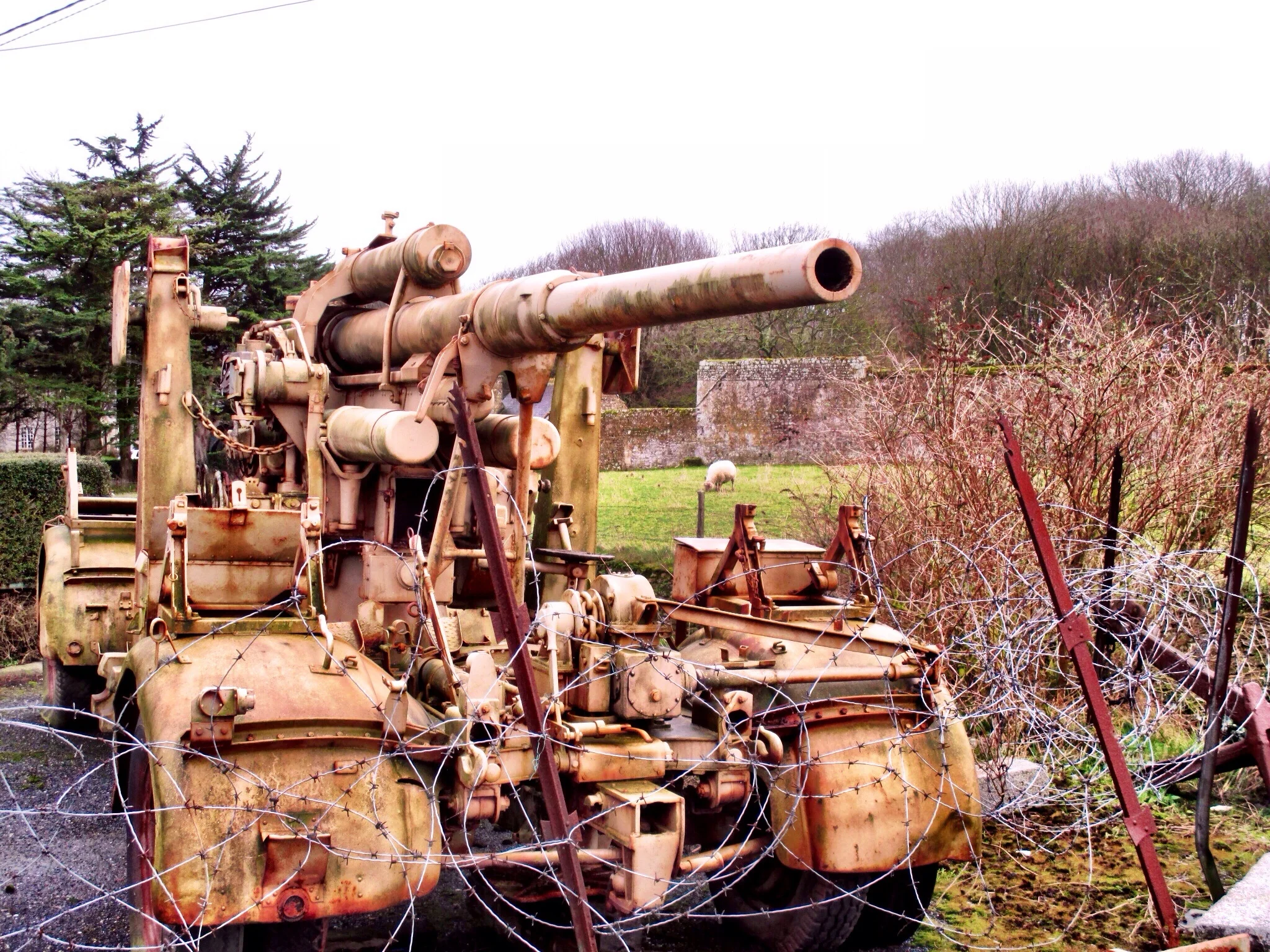 German artillery piece in a Normandy field
