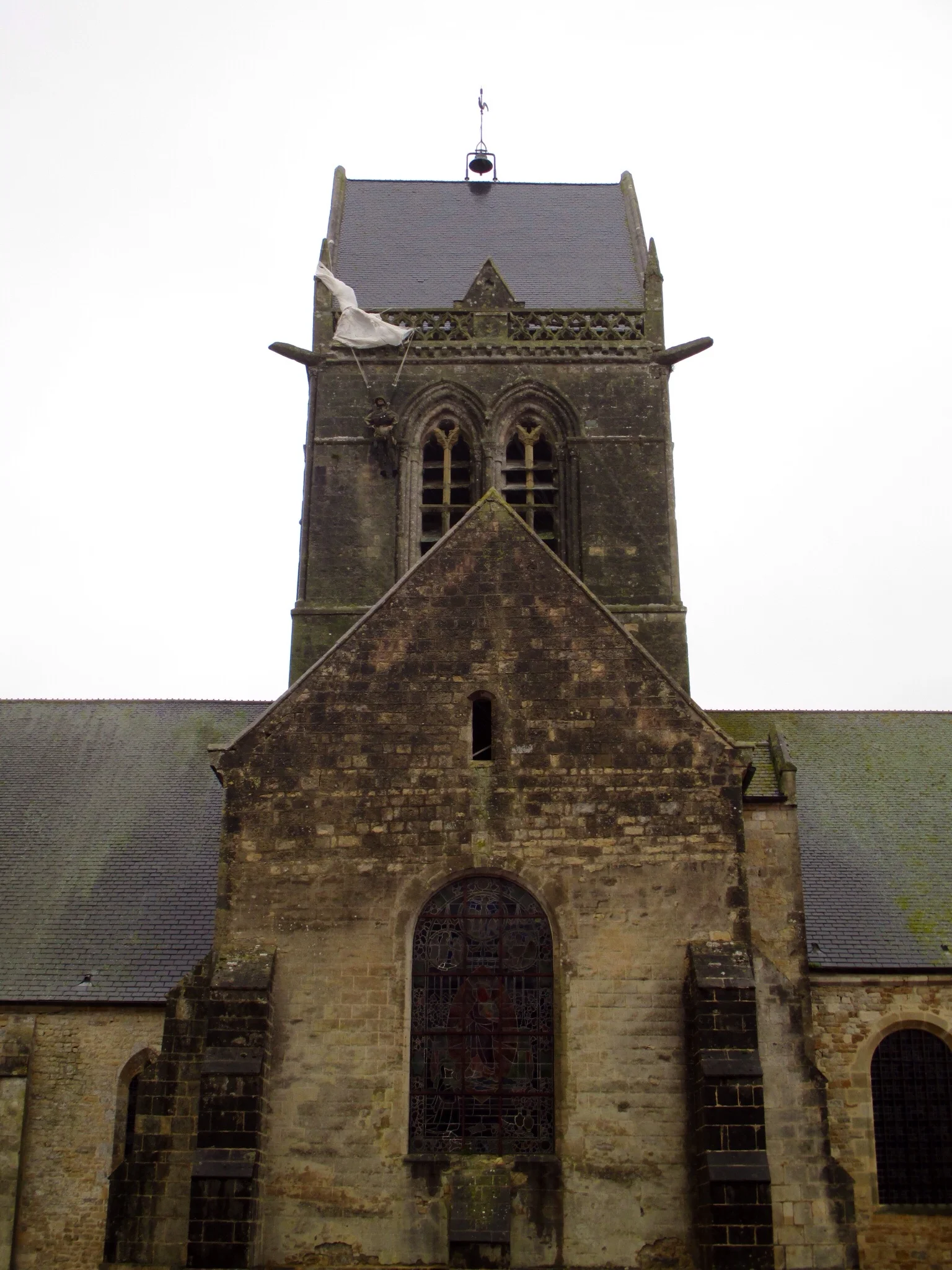 John Steele mannequin on the church at Sainte-Mère-Église