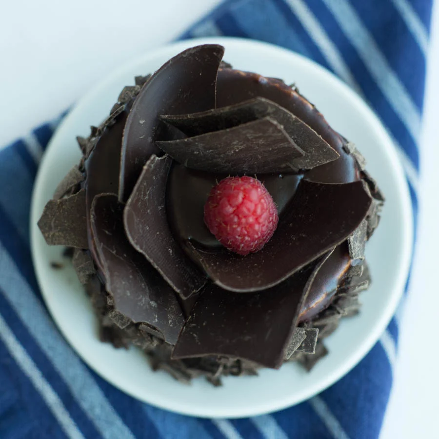 This little individual chocolate mousse cake gave me nothing but trouble. Of the 25 or so different setups I tried, this is the only one that I am happy with. You win some, you loose some. This time, the cake won.