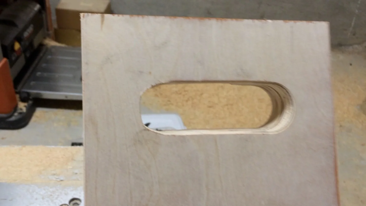 Then, I glued in the front panels and back panel. I attached them with brad nails temporarily until the glue would dry. 