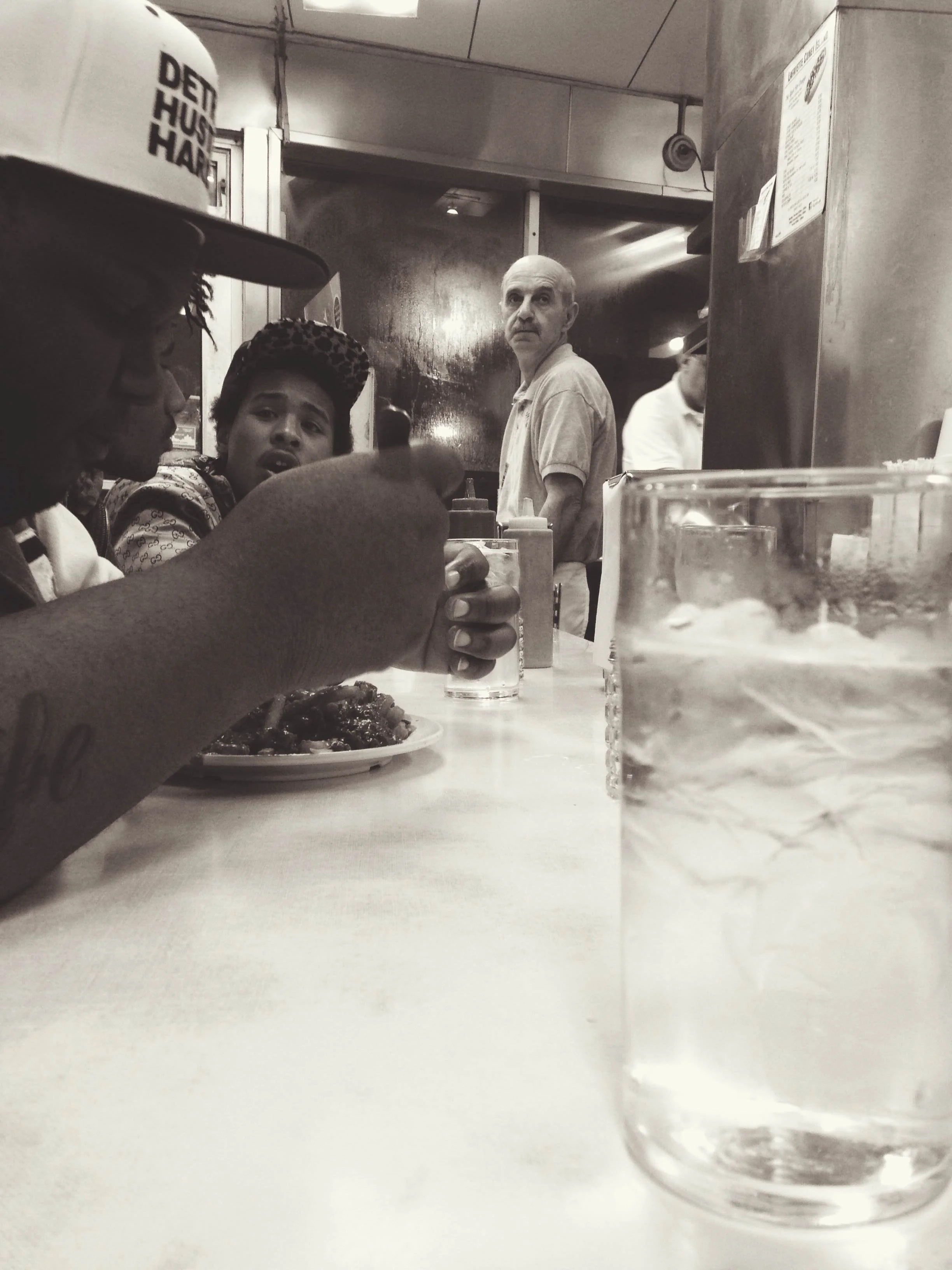 Eating at a local Chilli Dog spot with Chicago's international "Dj Earl", Local Detroit artist "Kash The Kush Man" with Danny Brown's Bruiser Brigad e artist "Clay"