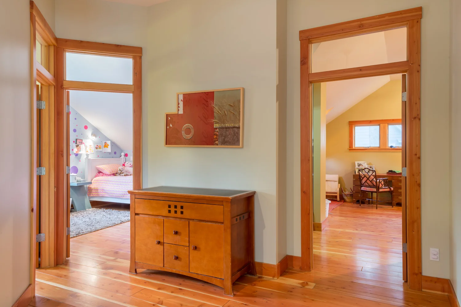 Transoms above doors share light from bedrooms.