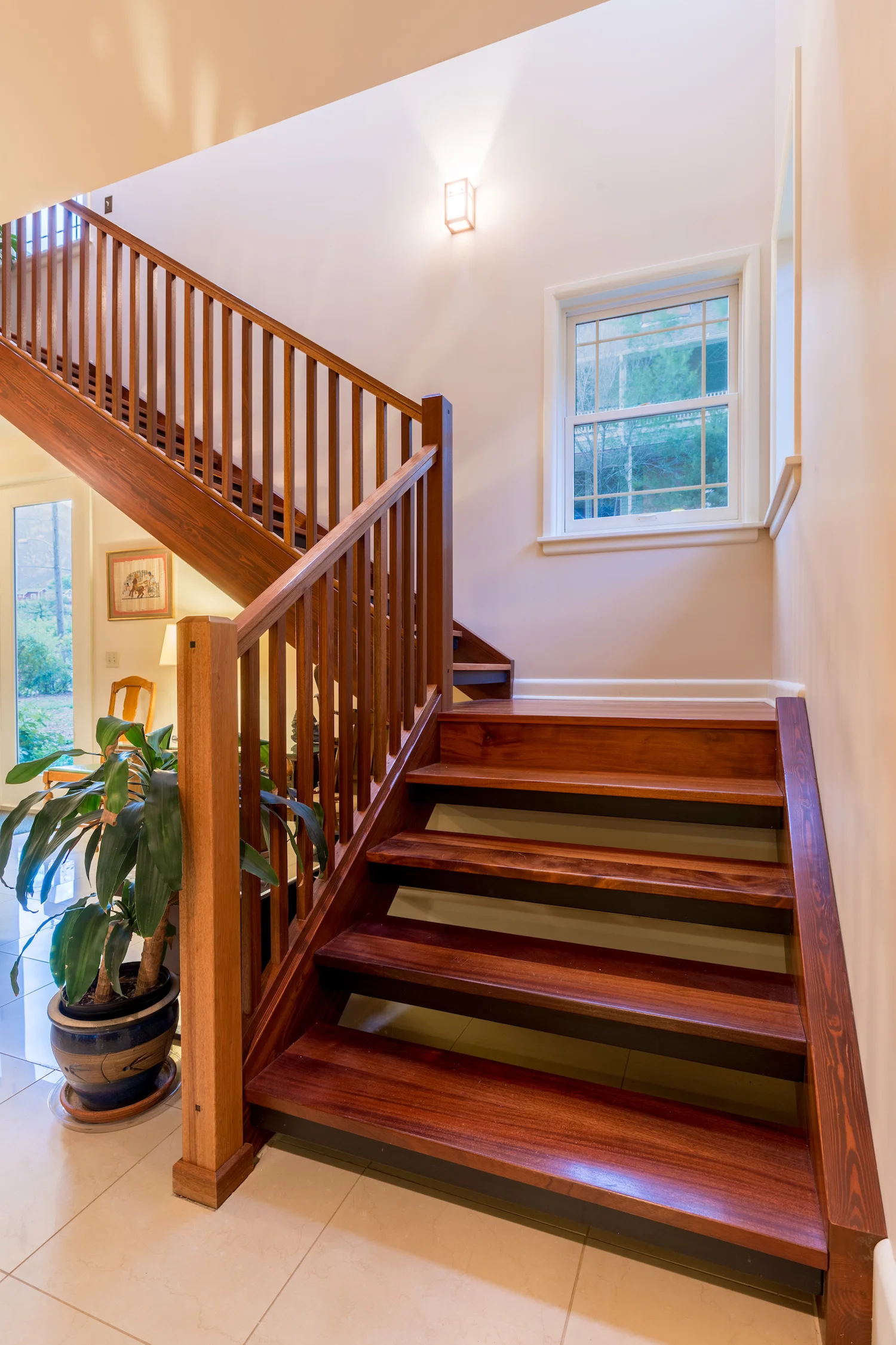 The stairs have mahogany treads and railings; the stringers are made from very strong fir glulams. 
