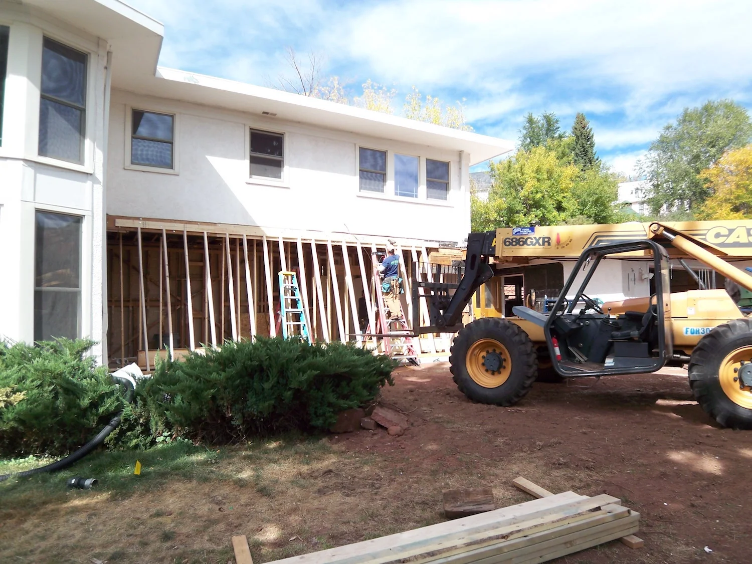  The exterior walls, floors, and the roof were braced and supported for the installation of 2 flush steel beams. 