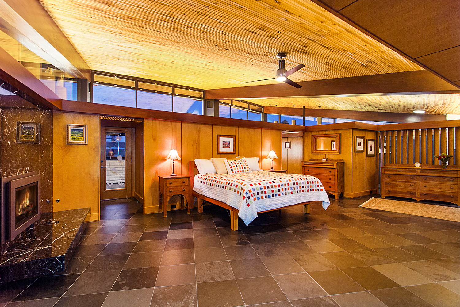 Solid birch panels create the walls in the master bedroom.