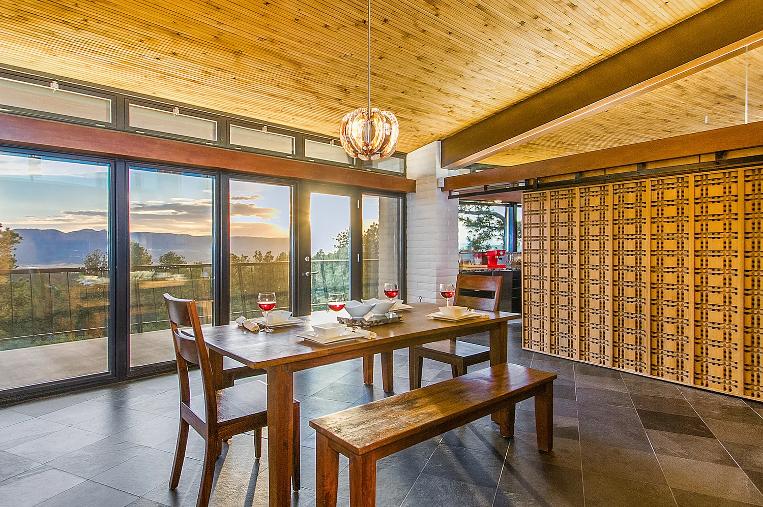 Frank Lloyd Wright designed panels were bought at auction and installed as a sliding panel room divider.
