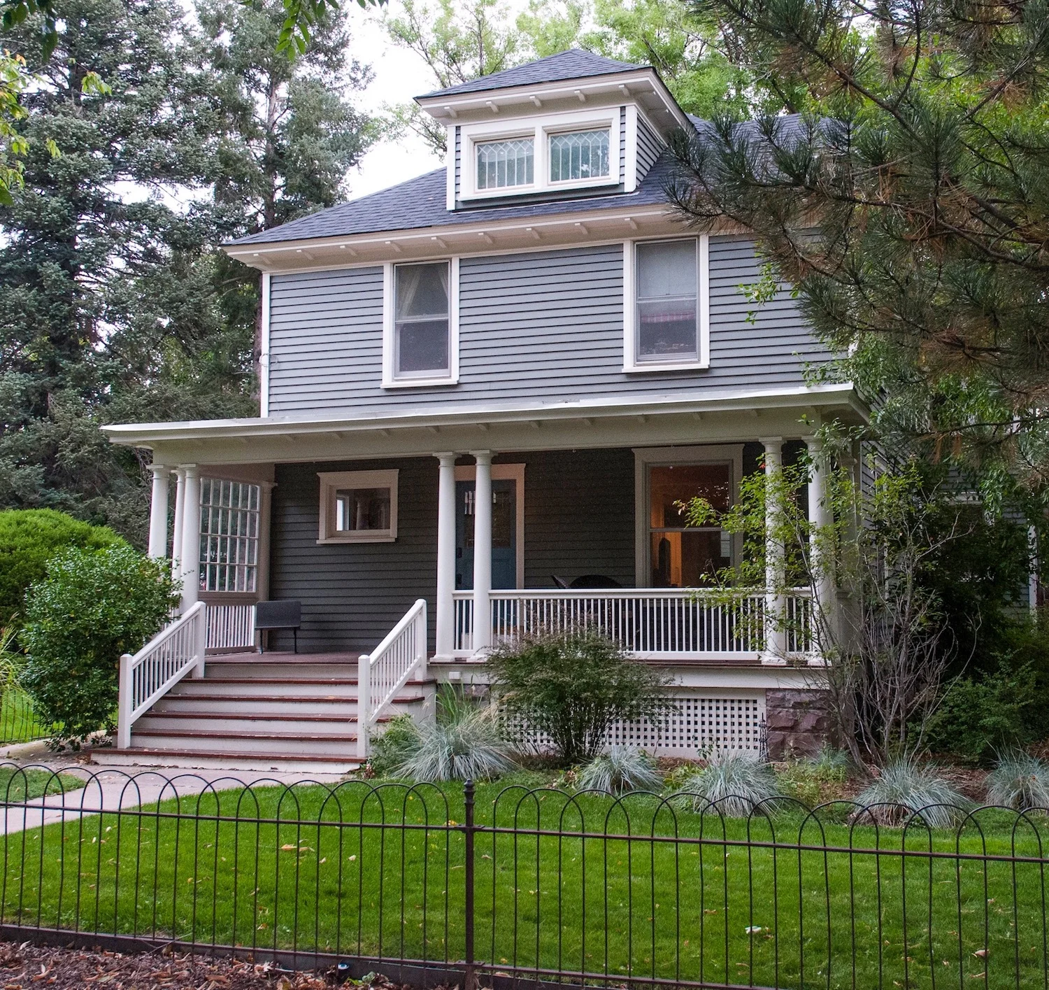 After: All vinyl siding was replaced with Artisan Series HardiePlank siding with a 5/8" reveal for a more historic profile. It is also more impervious to hail than other types of siding.