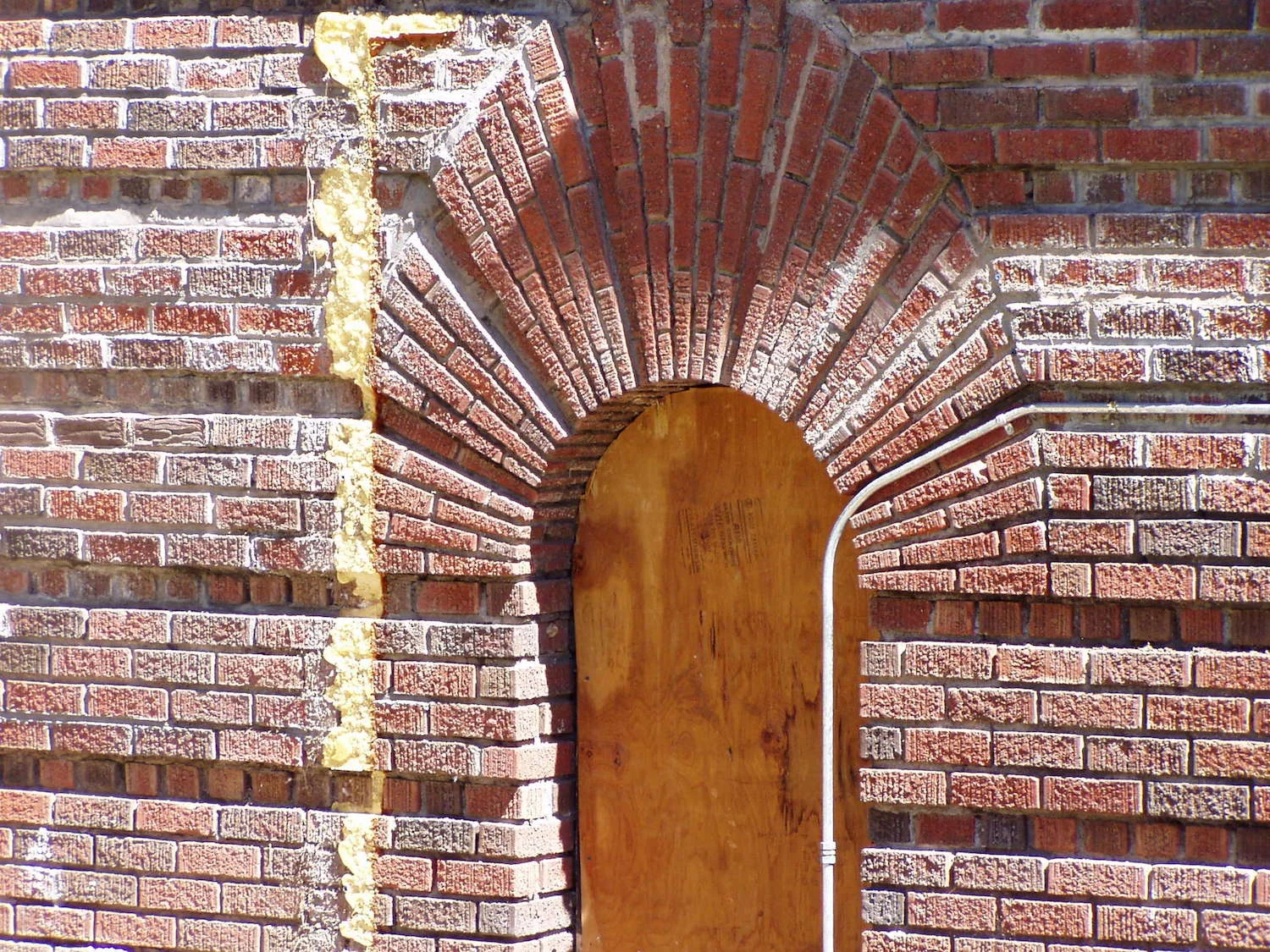  Before: Windows had been removed and masonry compromised. 