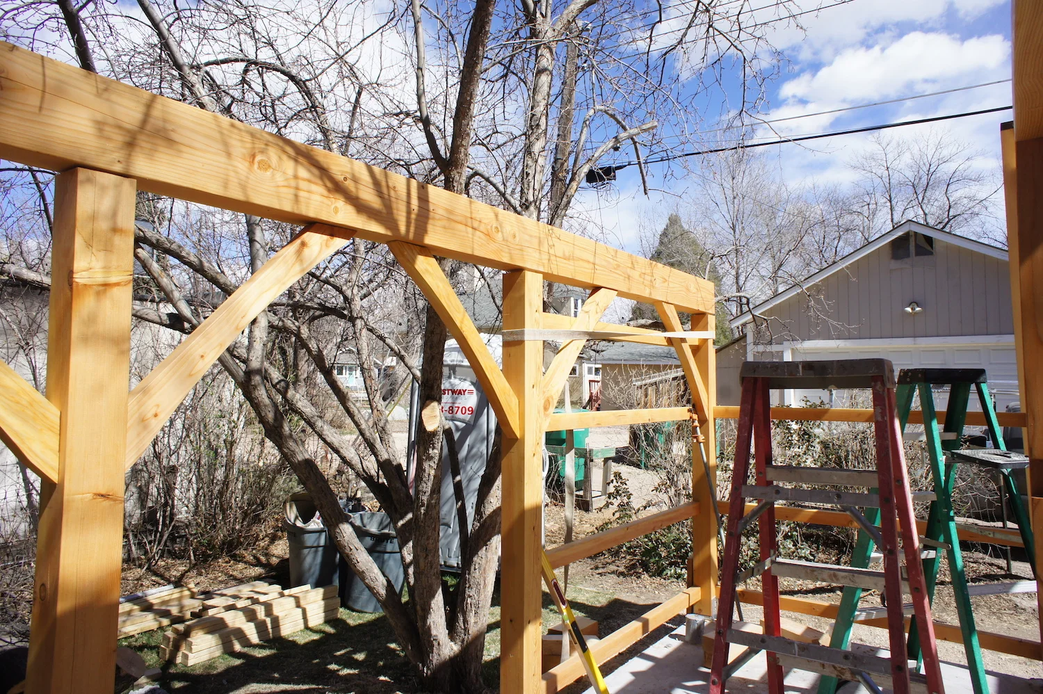 Straps and clamps hold a girt together while it is raised and the joints are tightened.