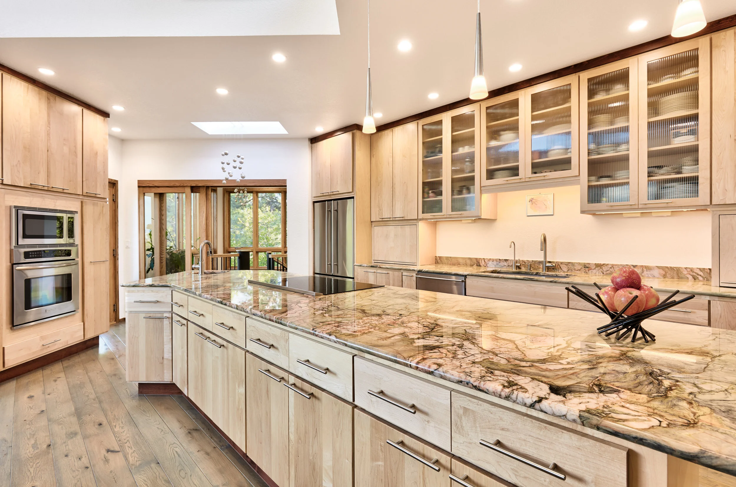 Cherry trim accents the maple cabinets and blue-stained white oak floor.