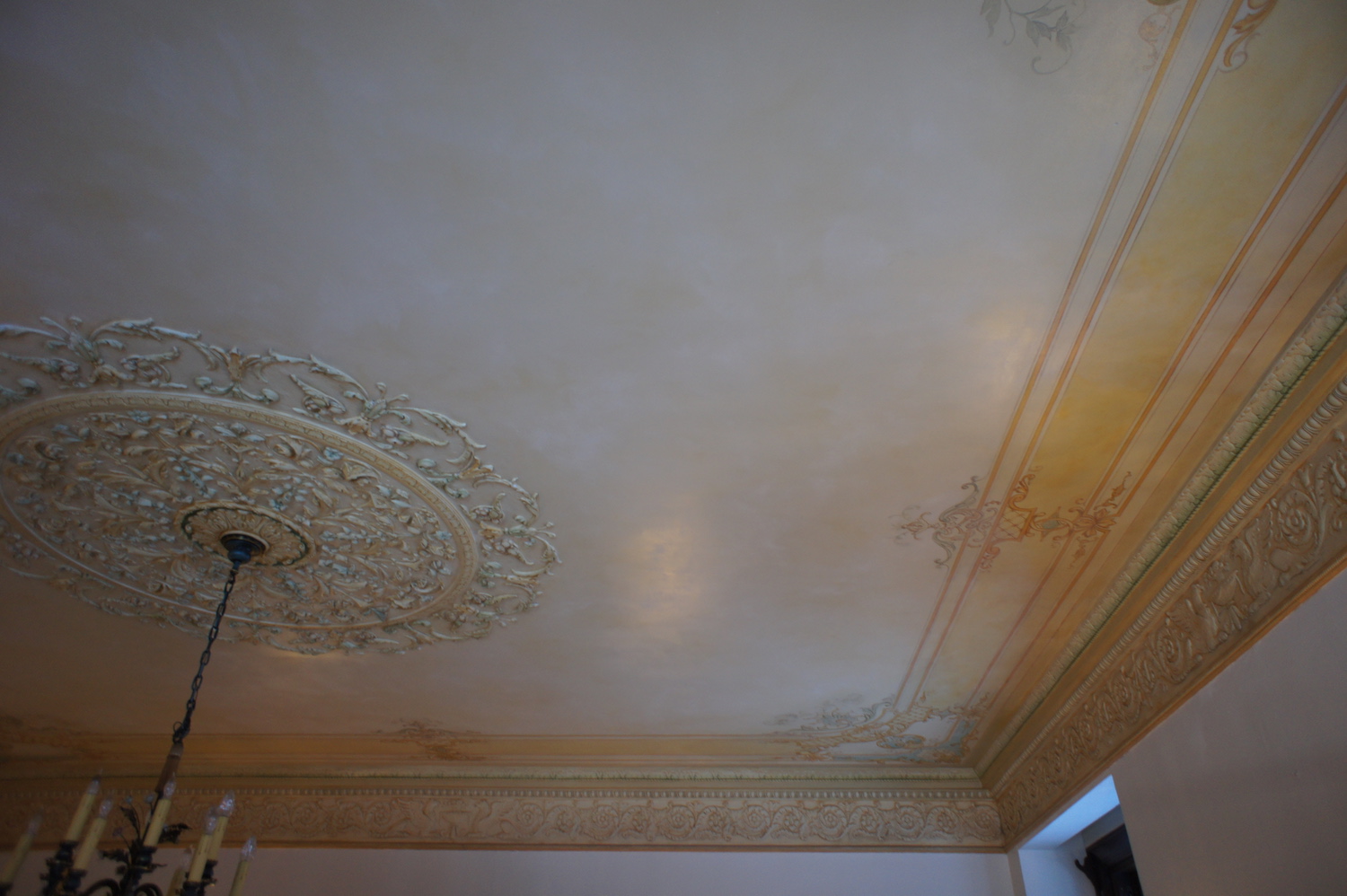  Local artist, Lori DiPasquale, restored the artwork and reglazed the ceiling. 