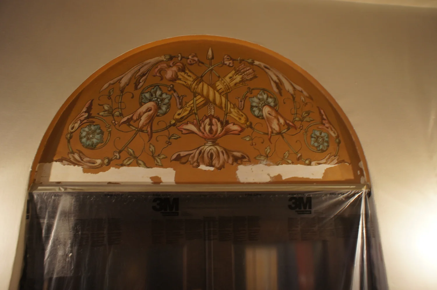  The painting in this arch above a book case had deteriorated. 