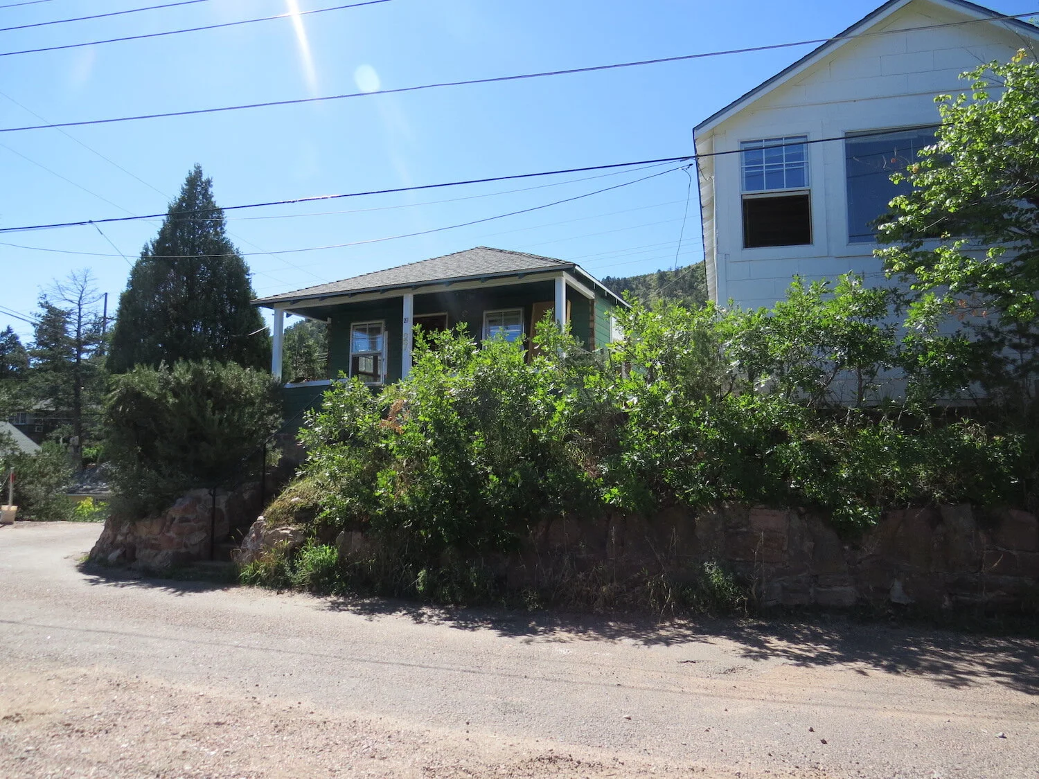  The location of the two original cabins remains the same in the new design; the renovation connects the buildings so the finished residence can function as one space.  