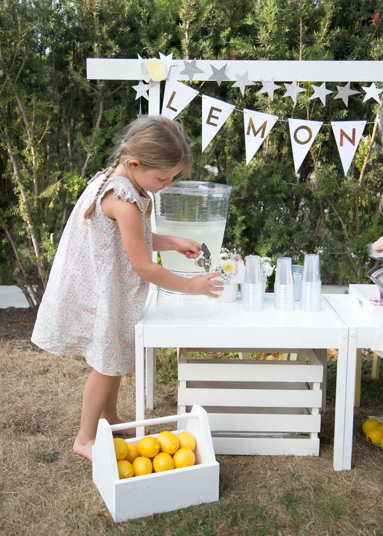 Noelle filling up lemonade