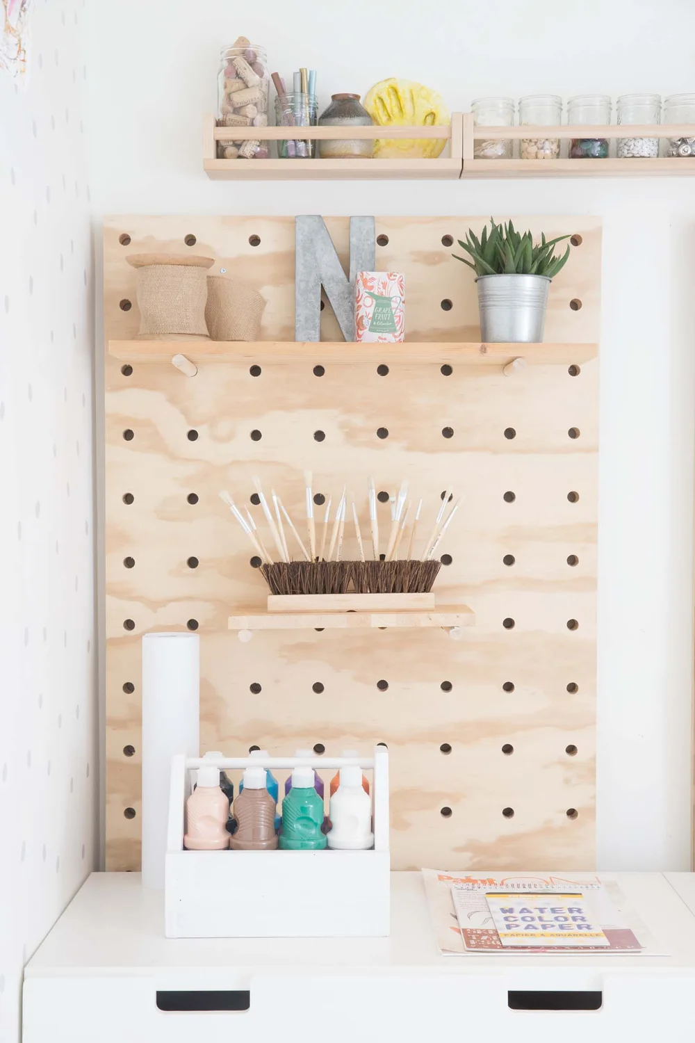 DIY giant pegboard for kids art studio in vancouver, canada