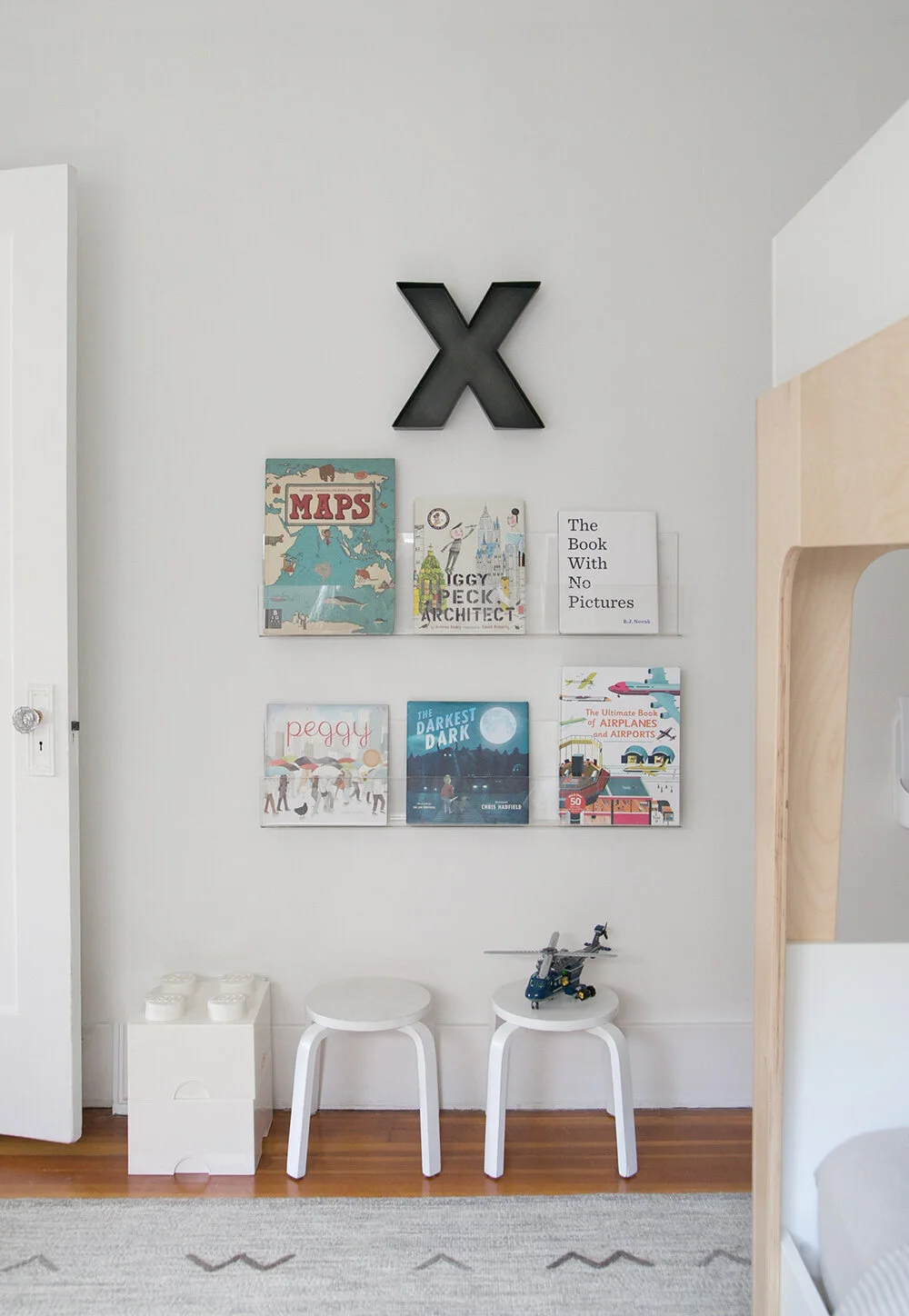 acrylic bookshelves in boy room