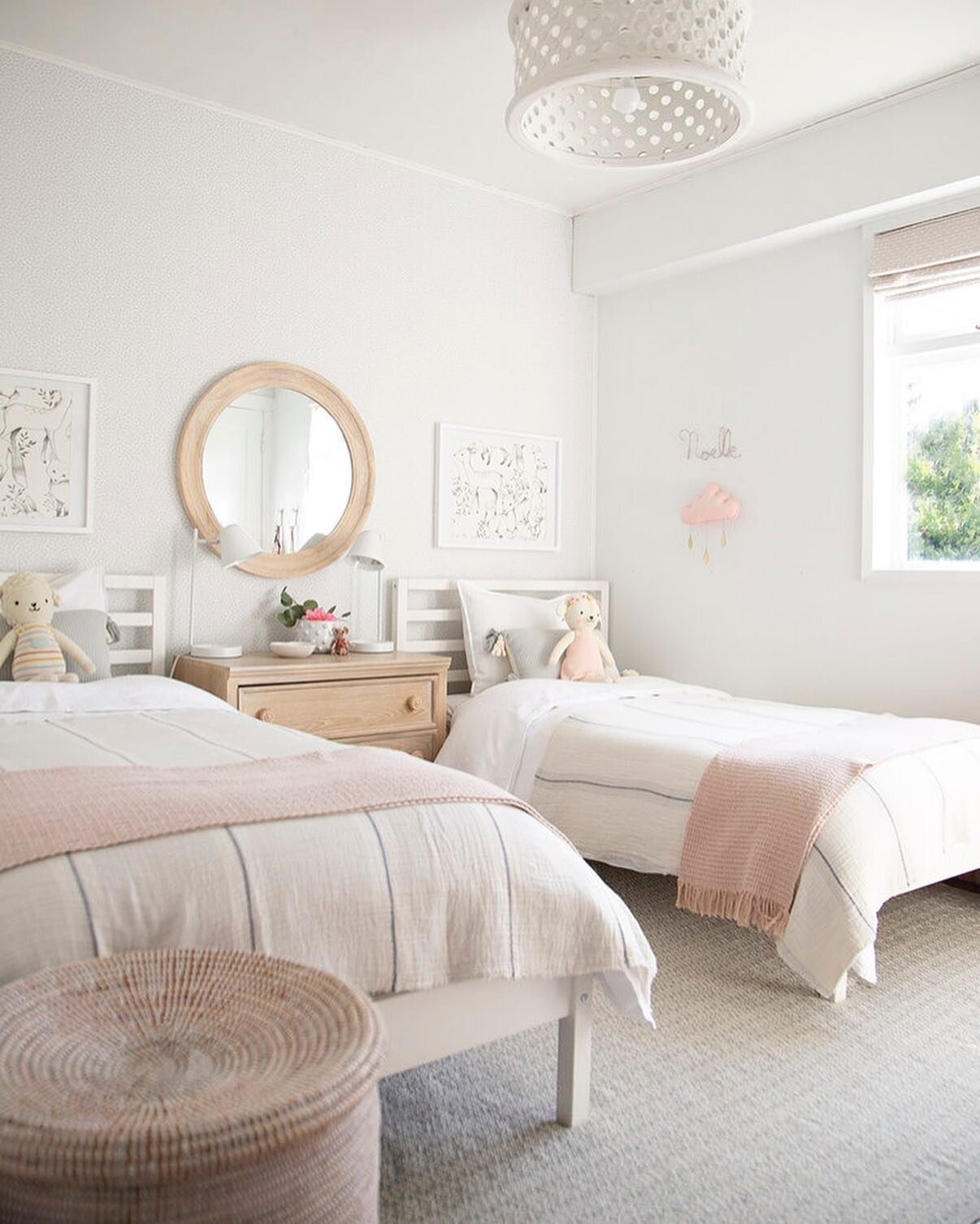 With a very simple box room and standard white wood beds, we worked to create a pretty and functional room for my own sweet girls! This room proves that a lot can be done with soft furnishings...bedding, pillows and a lovely rug. #winterdaisyrentalho