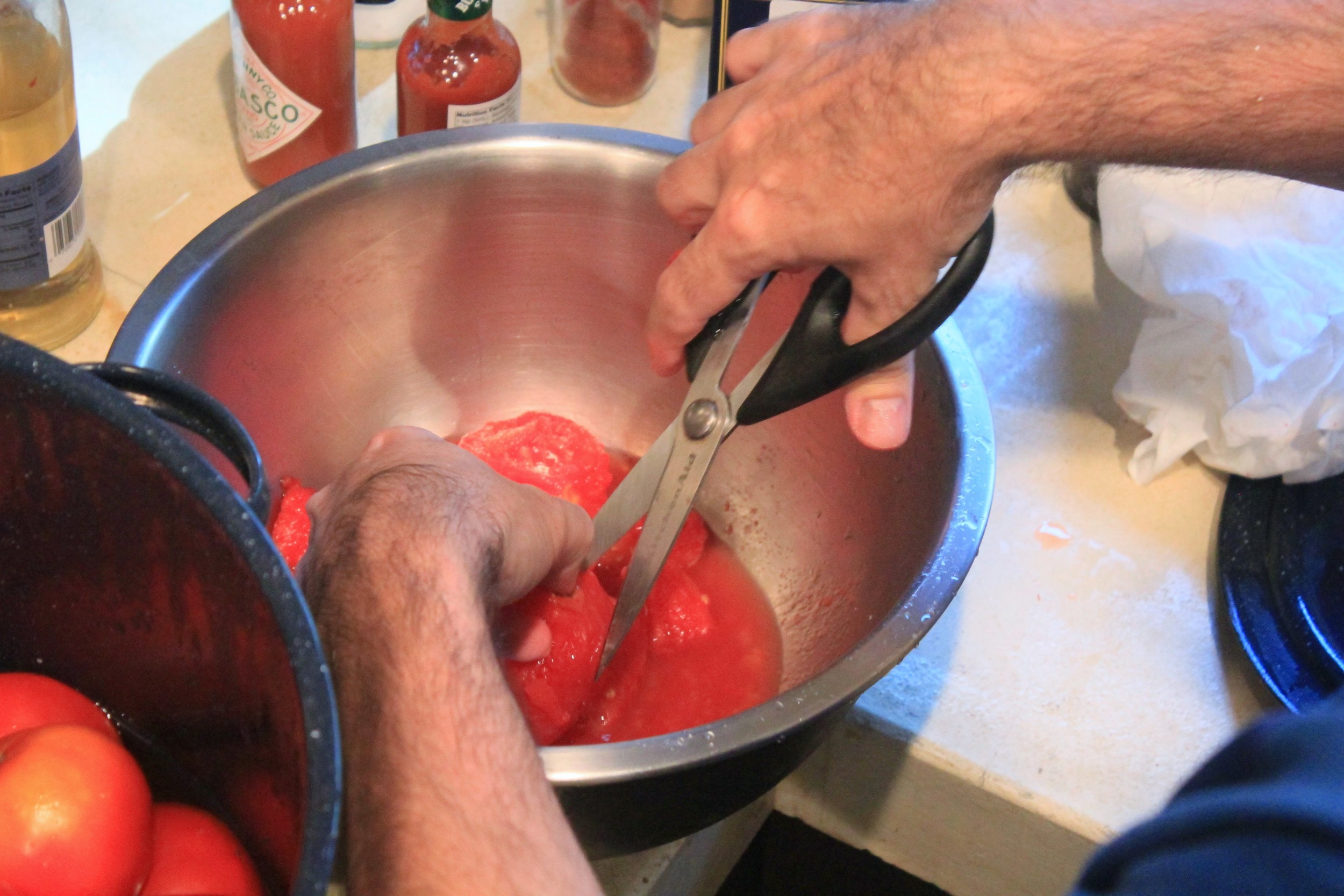 Using that kitchen shears to cut out the stem core