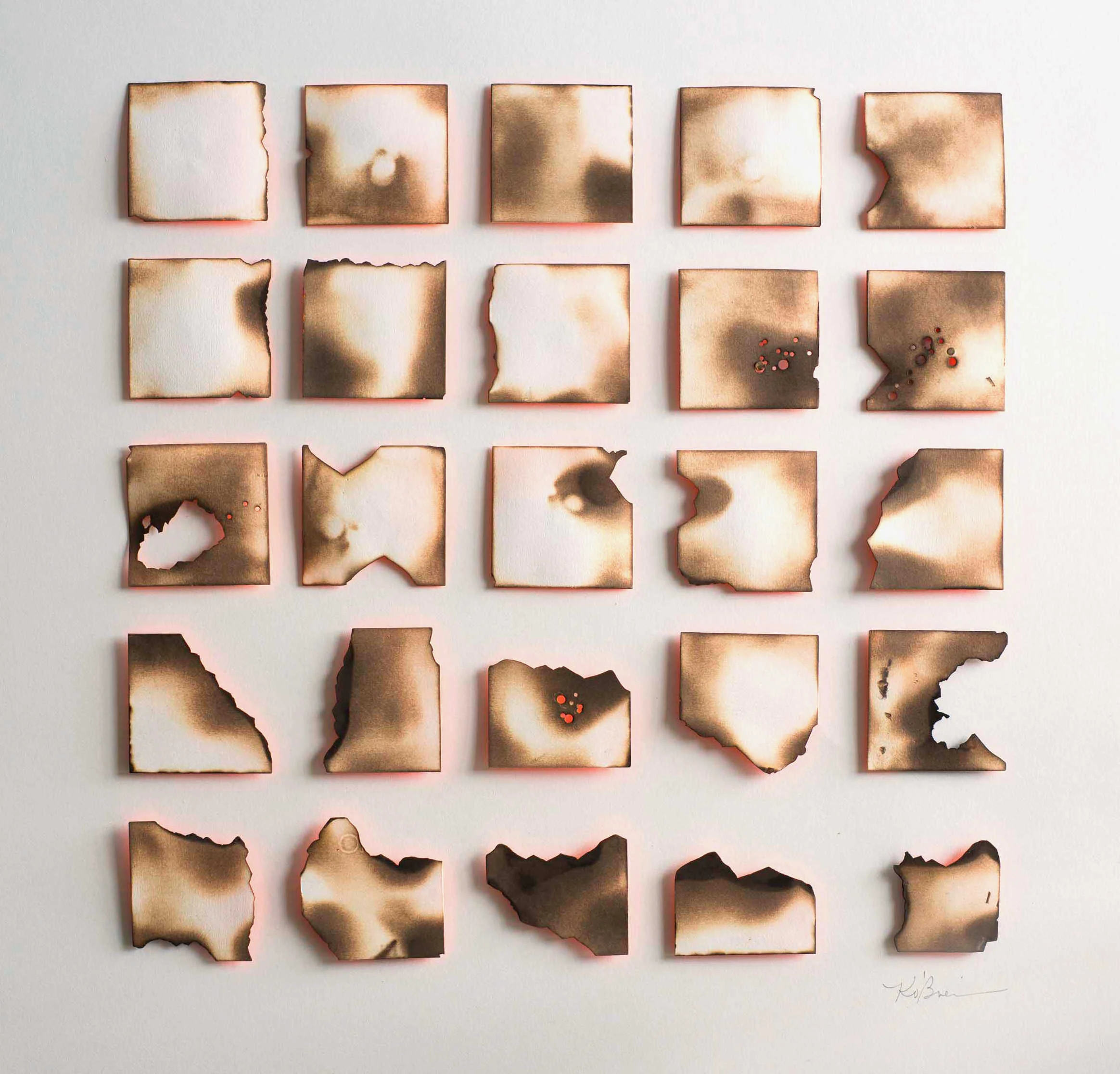 Kelly M. O'Brien, Playing With Fire No. 43 (Phases 6) . Paper, spray paint, flame. 28 x 28 x .5 inches. ©2017.