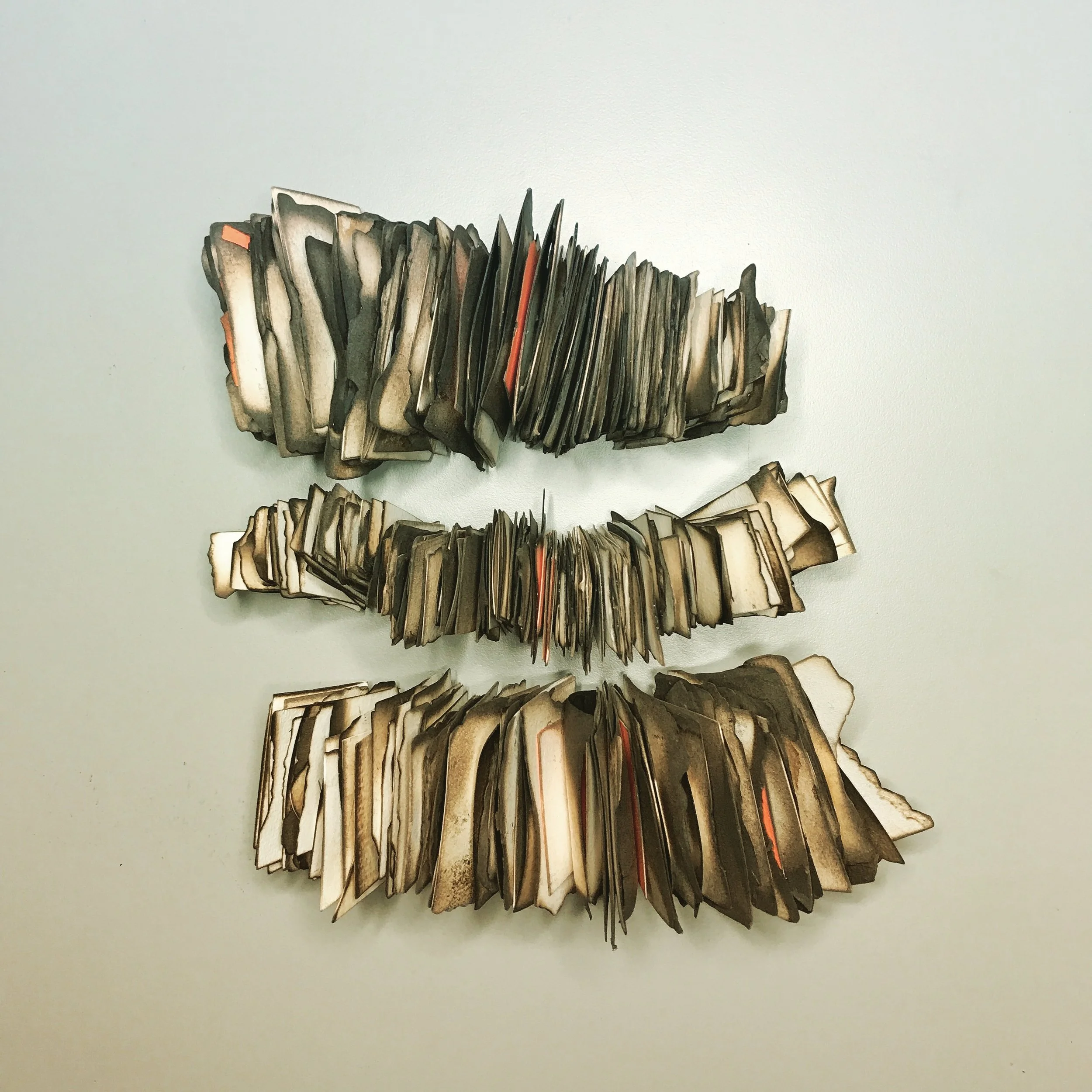 Kelly M. O'Brien, Play With Fire No. 51 (Edgy 5) . Paper, flame, binders thread. 14 x 14 x 2.5 inches box framed. ©2017.