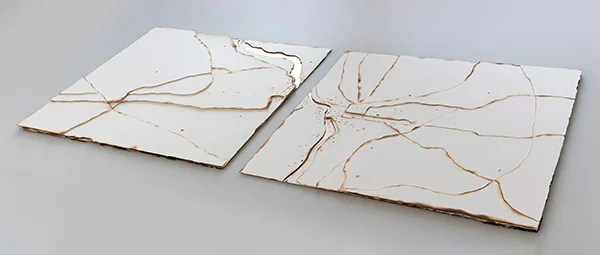 Kelly M O’Brien, Playing With Fire-No. 81 (diptych) Paper, gold leaf, flame. 31 x 37 x 1.5 in | 79 x 94 x 3.8 cm. ©2019 Commissioned for JW Marriott Hotel, Washington, DC. Photography: Image Centre