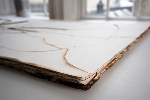 Kelly M O’Brien, Playing With Fire-No. 81 (diptych) Paper, gold leaf, flame. 31 x 37 x 1.5 in | 79 x 94 x 3.8 cm. ©2019 Commissioned for JW Marriott Hotel, Washington, DC. Photography: Image Centre