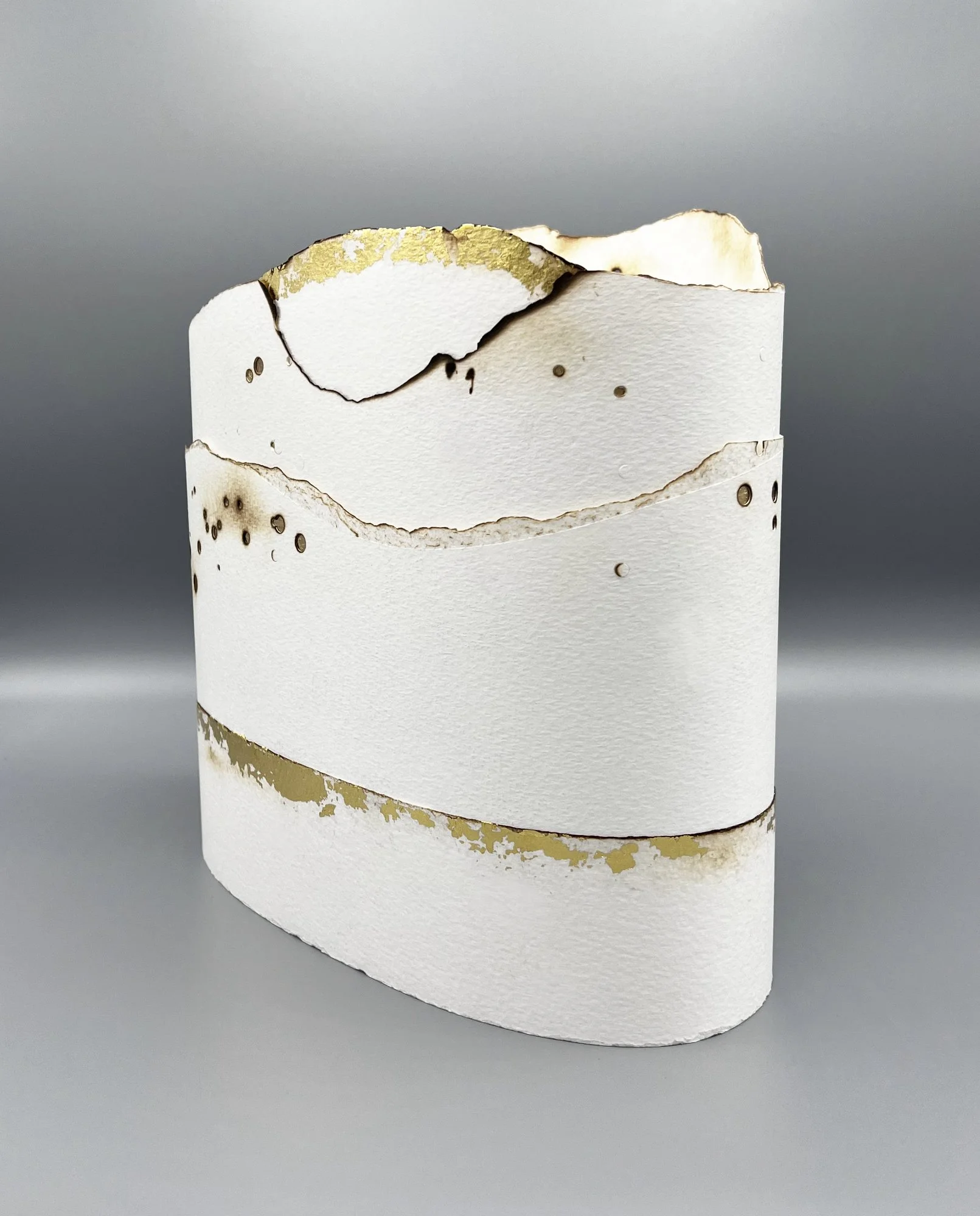  Kelly M O’Brien,  Torched, No. 1 . Paper, 24K gold leaf, adhesives, binder’s thread, rigid internal support. Hotel lobby commission, Las Vegas, 2025 