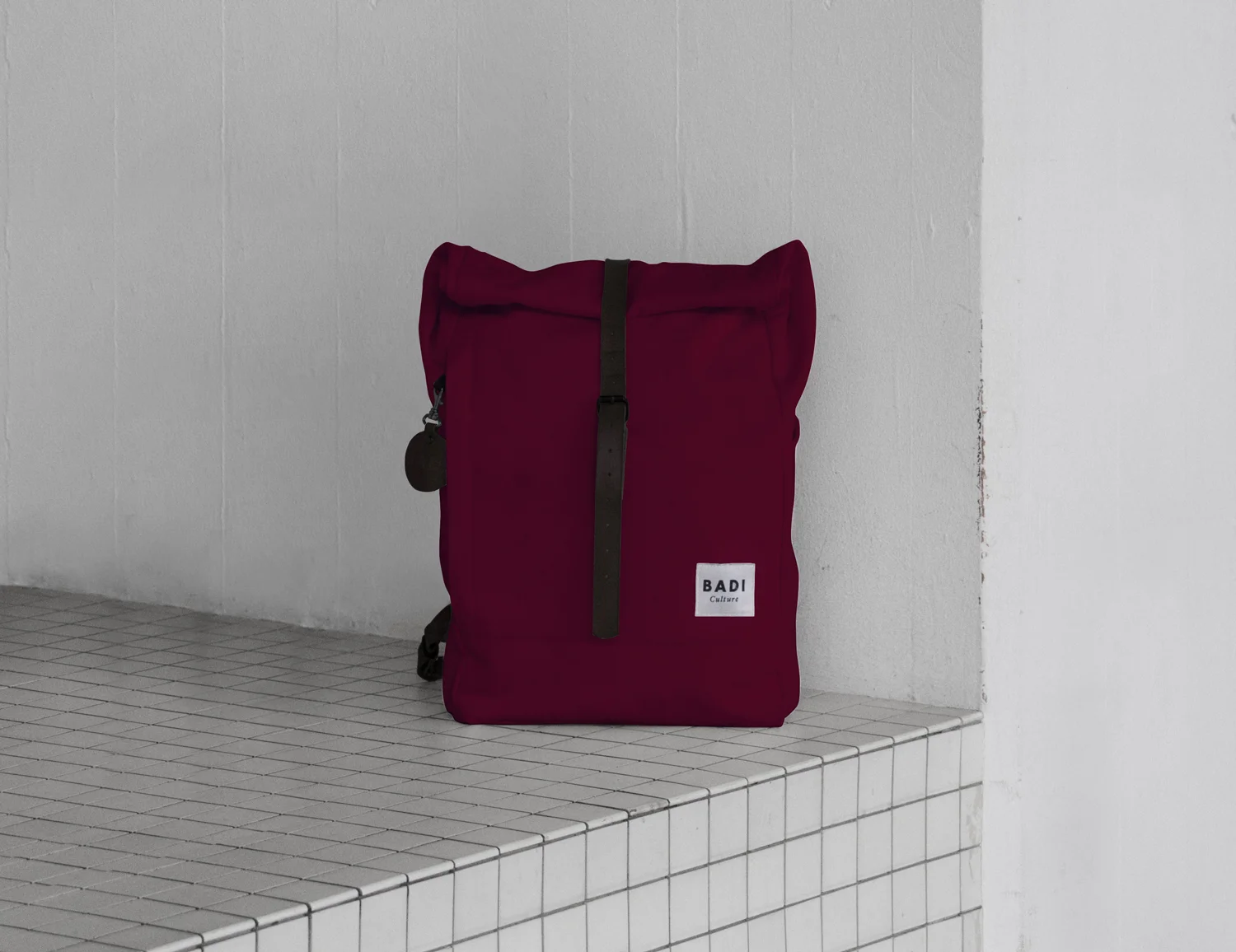 The Roll-Over backpack in bordeaux with black leather