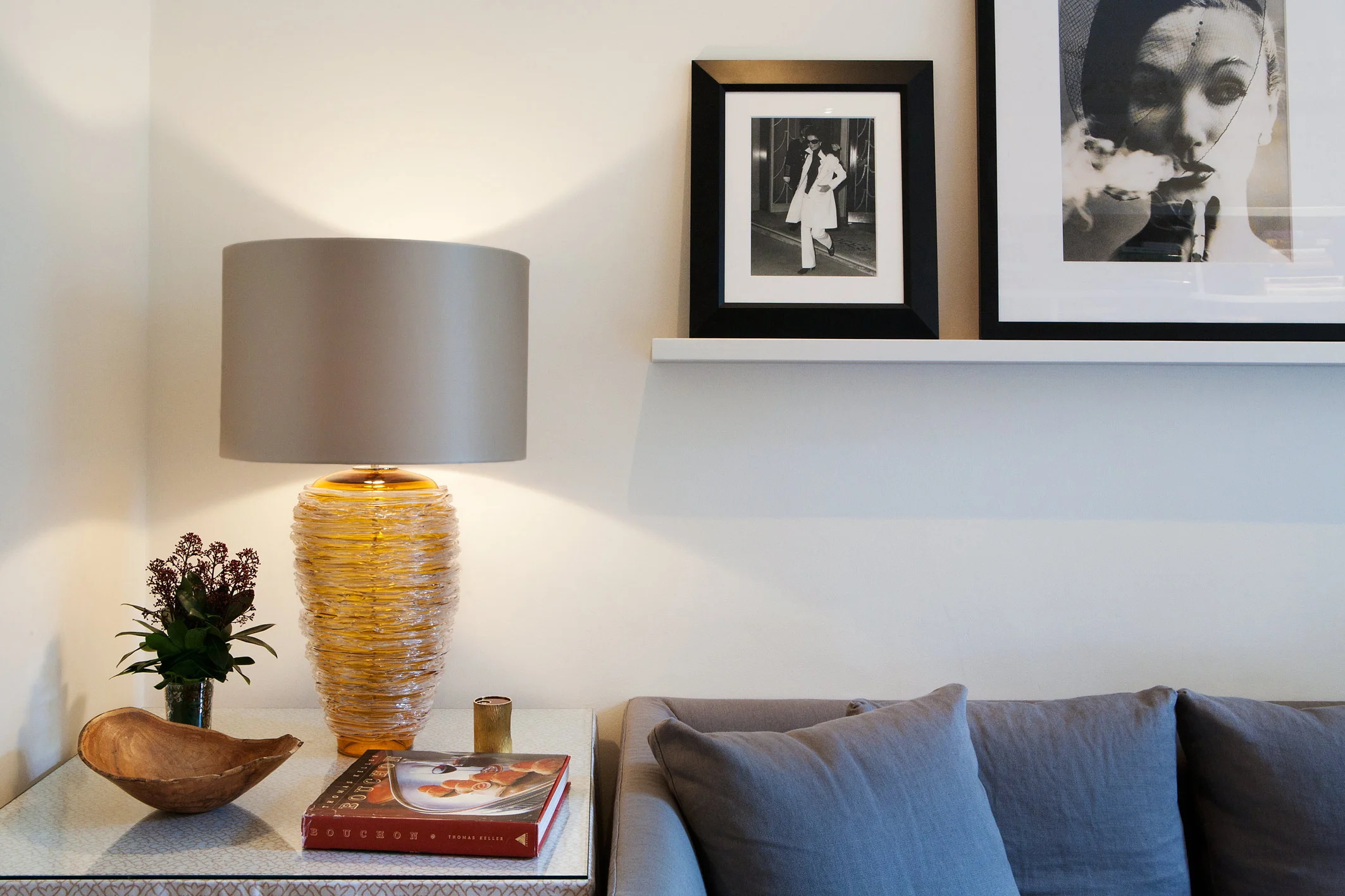 A custom-made side table for the high-sided sofa