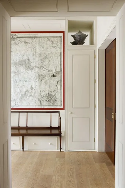 Striking use of a map set within panelling in Will Fisher's South-East London home