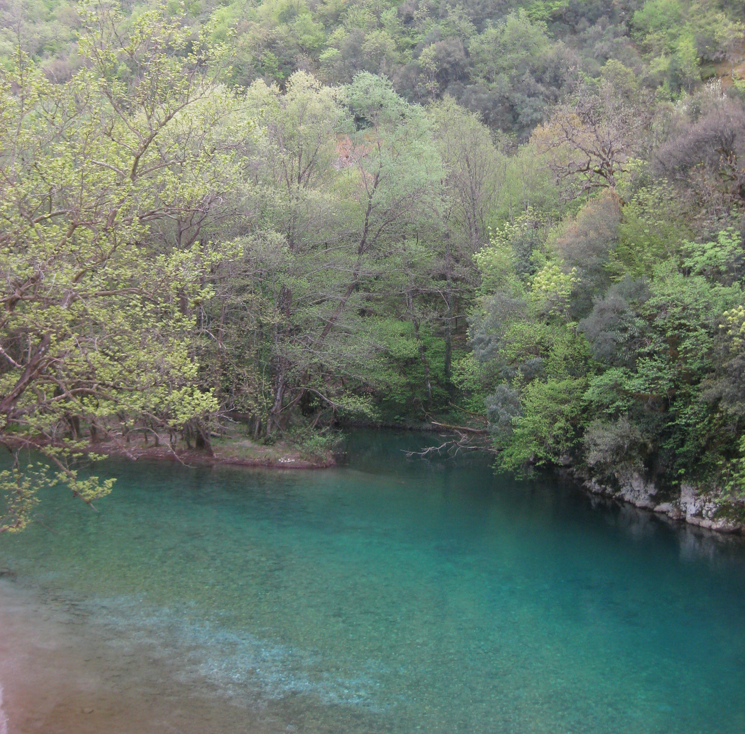 Vikos gorge. My husband couldn't resist the freezing turquoise waters, and jumped right in