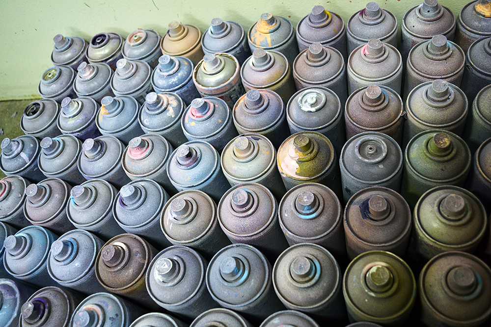 spray cans used by artist ali tareen for art project.jpg