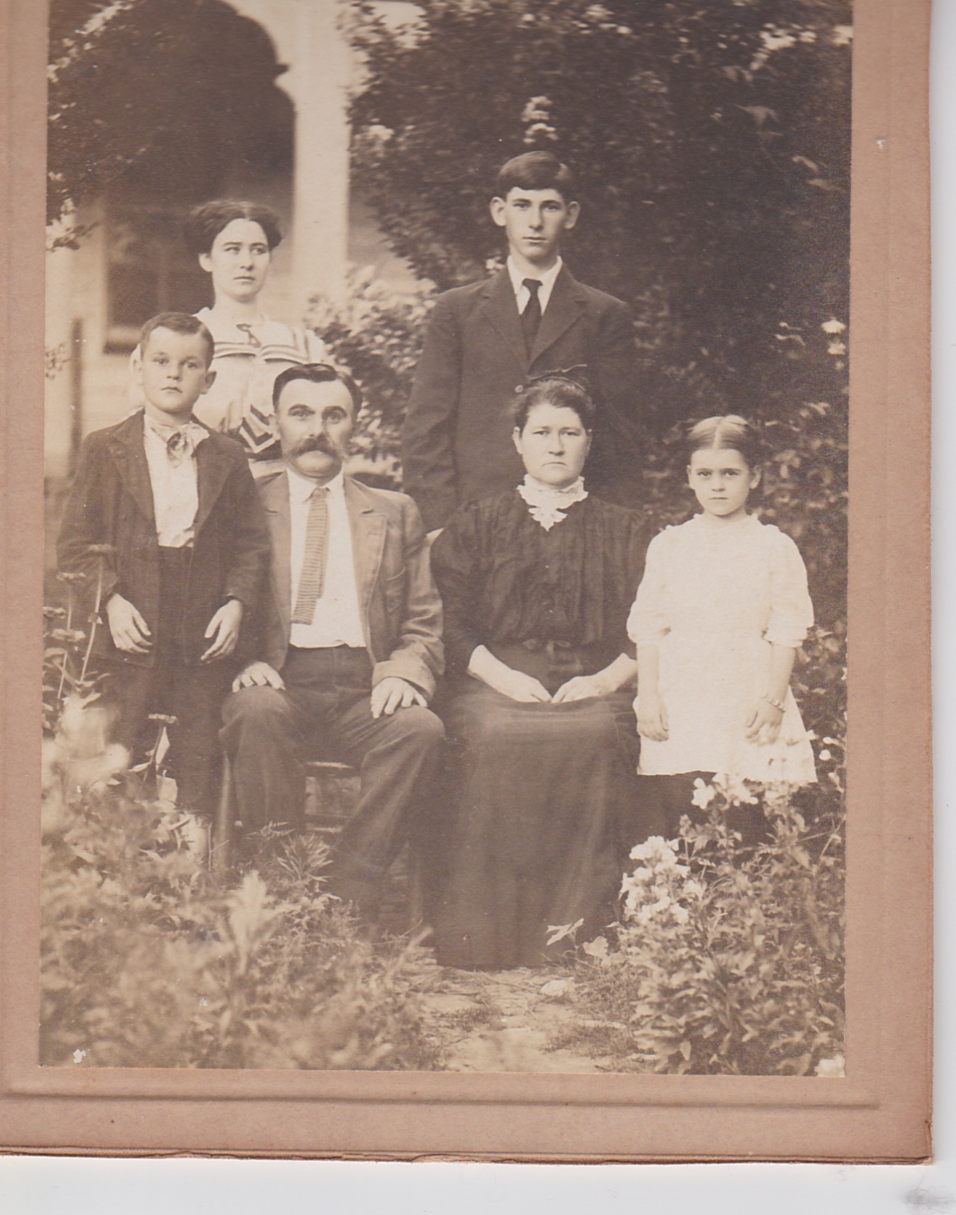 My great-grandmother Jennie Moore (back left), her brother Andy (back right), her mother Martha, stepfather Jacob and half-siblings Jake and Mayme Van Bibber. 