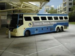 Disney's Magical Express provides shuttle services from Orlando's International Airport (MCO) to the on site Disney resorts at no additional charge